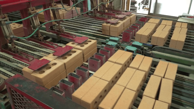 Bricks being processed on a conveyor belt