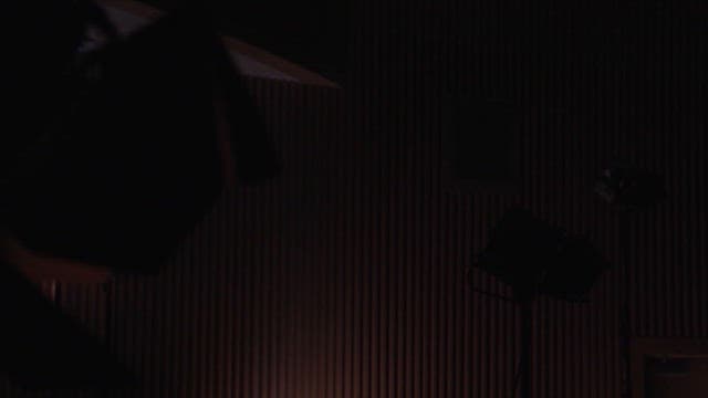 Dark Room with Professional Studio Lighting Equipment