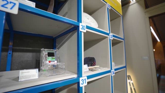 Technology artifacts displayed on shelves