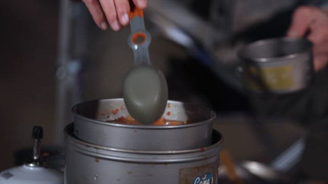 Spicy Stew Cooked in a Portable Pot for Camping