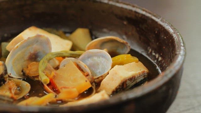 Savory Cheonggukjang with tofu, vegetables, and clams