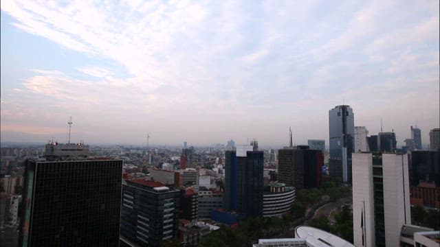 Cityscape with traffic and modern buildings