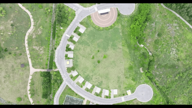 View of a park with surrounding roads