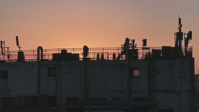 Sunset over city skyline with buildings