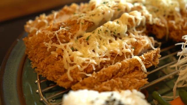 Melty Cheese Topping on Crispy Pork Cutlet