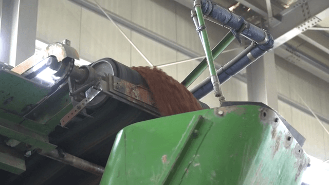 Dirt being processed in machine