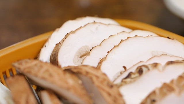 Sliced shiitake mushrooms in a basket