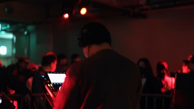DJ Communicating with the Audience in the Club