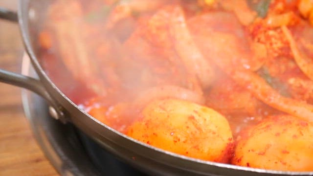 Sizzling Spicy Stew with Vegetables and Meat