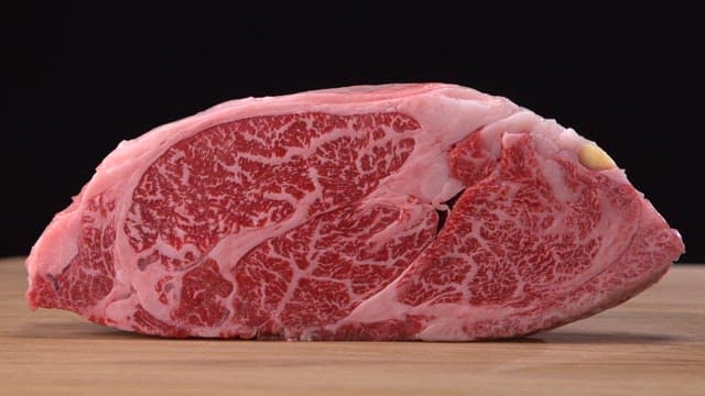 Close-up of marbled beef on a wooden board