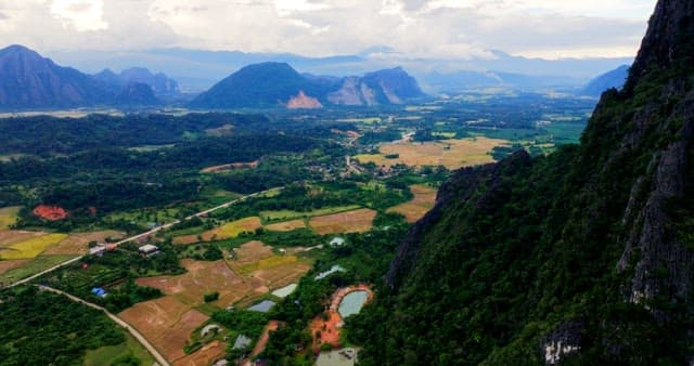 Scenic Aerial View of Lush Valley and Mountains