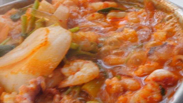 Steaming Spicy Seafood Stew with Various Vegetables