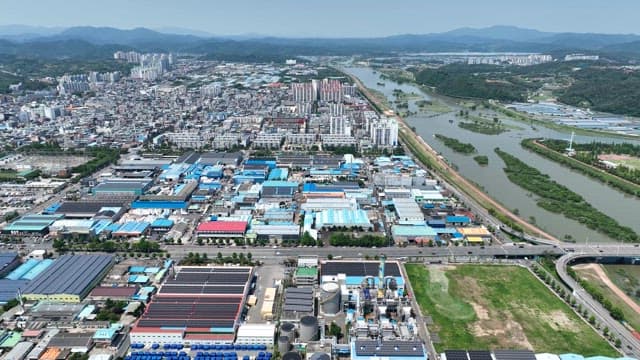 Sprawling cityscape with a river