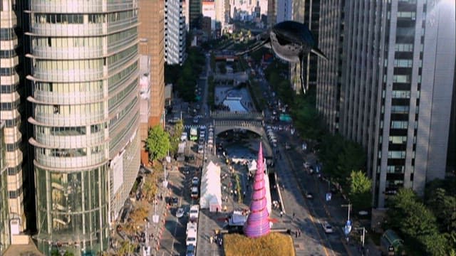 Giant Whale Soaring Over Urban Streets