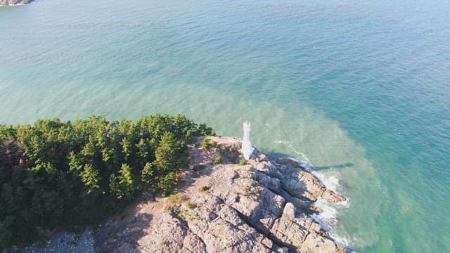 Lighthouse on a rocky coastline