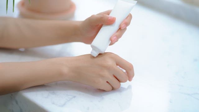 Applying hand cream