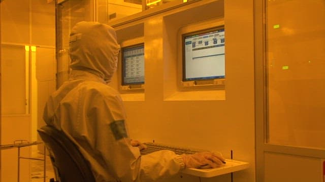 Technician Operating Equipment in Lab