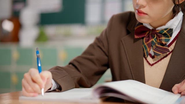 Student studying in a classroom