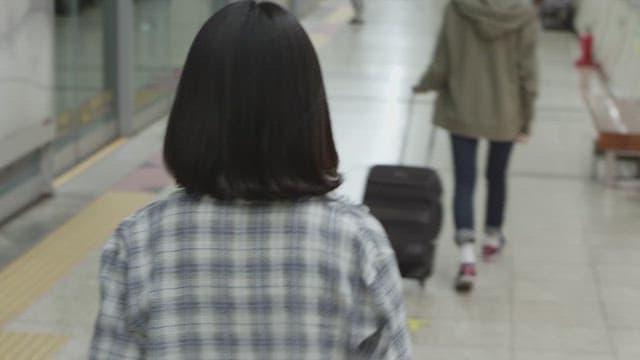 People waiting for the subway on the subway platform