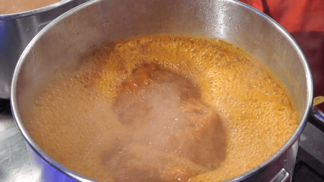 Pot of stew boiling on the stove