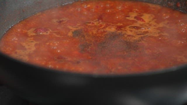 Spicy Sauce Simmering on a Pan