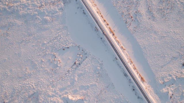 Car driving on a snowy road