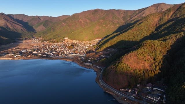 Mountain village by a serene lake
