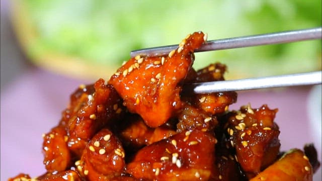 Chopstickful of spicy pork ribs