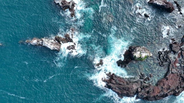 Rugged Rocky Coastline and Clear Emerald Sea