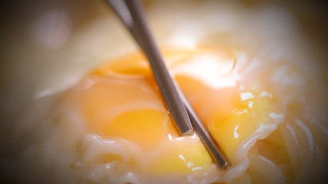 Wooden chopsticks for tearing a soft-boiled egg