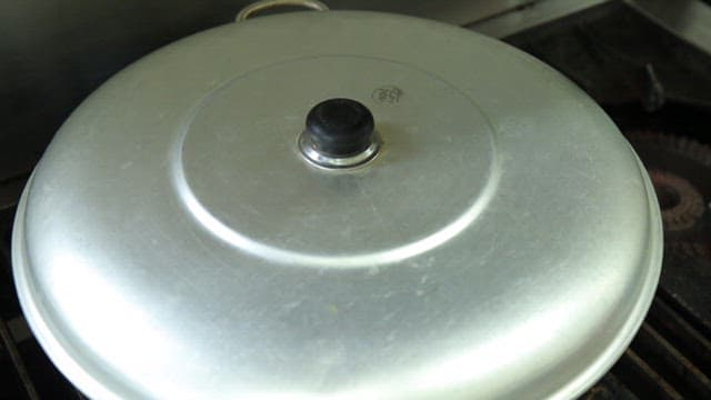 Steamed fish containing various fish simmering in a pot