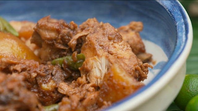 Chicken abodo with potatoes and peppers