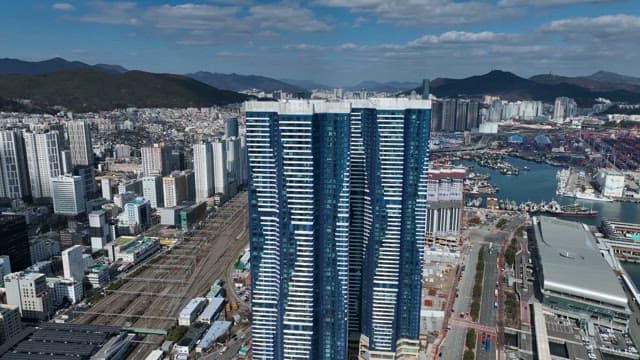 Tall skyscrapers in a bustling cityscape