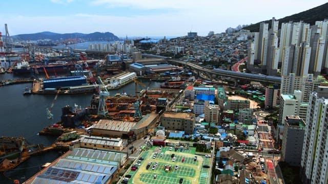 Bustling City Port and Residential Area