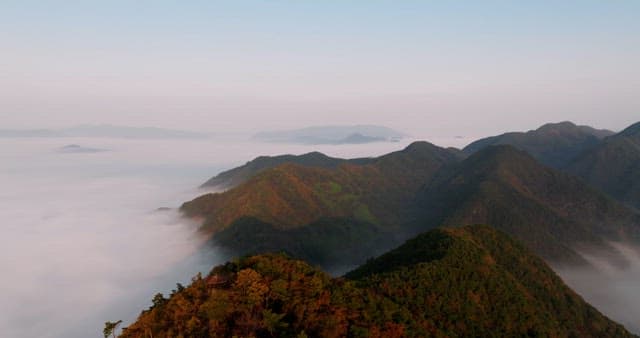 Misty Mountain Peaks at Dawn