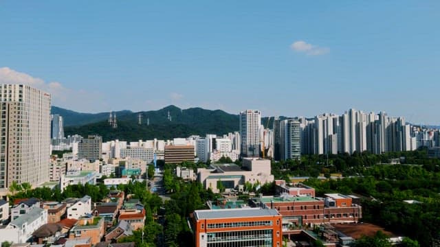 Cityscape with mountains in the background