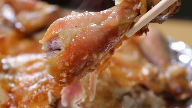 Juicy chicken leg of wood-fired chicken