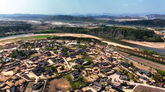 Traditional Korean house village by a river