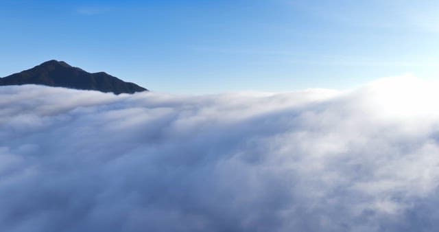 Mountain peak above the clouds