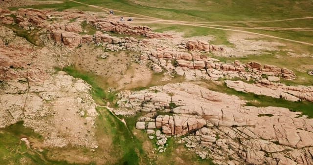 Rocky landscape with scattered greenery