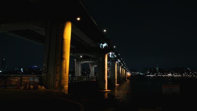 Illuminated bridge architecture at night