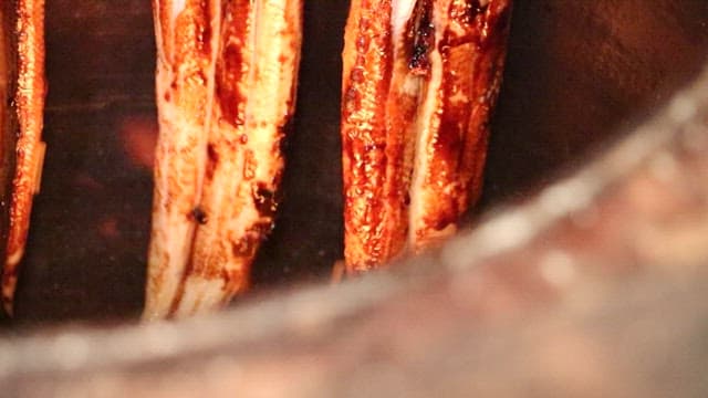 Eel being grilled in a jar