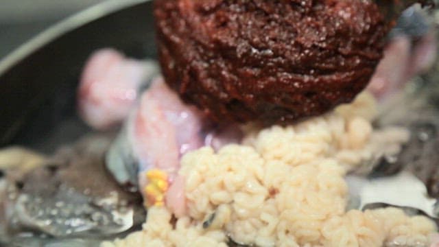 Marinade on top of prepared fish