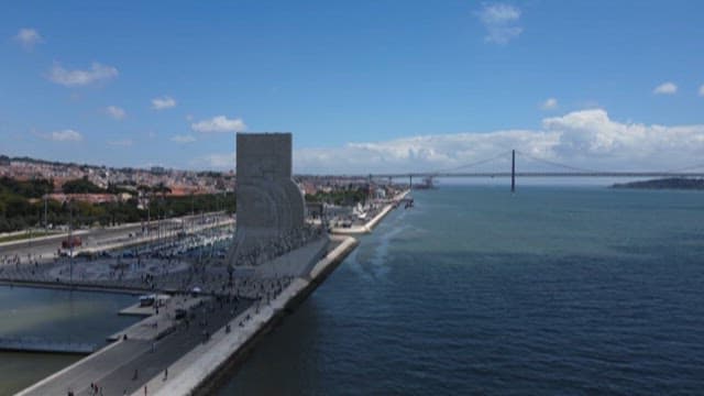 Tourists Gathering at a Riverside Padrao dos Descobrimentos in Lisbon