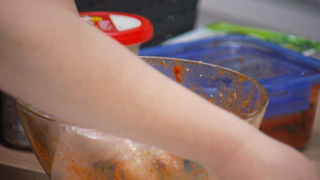 Freshly mixed green onion salad, plated on a plate