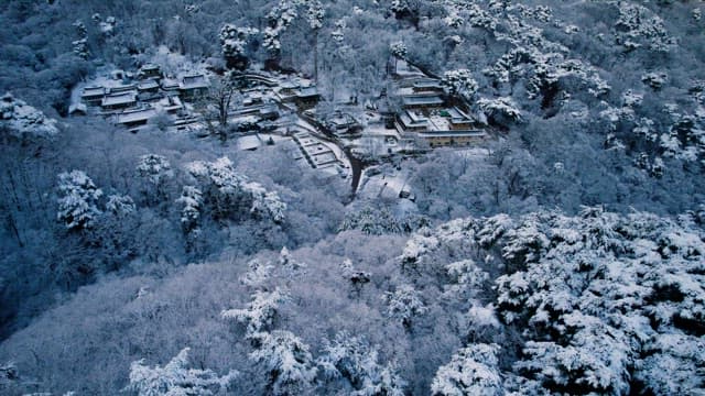 Mountains and Temples Turning White with Snow