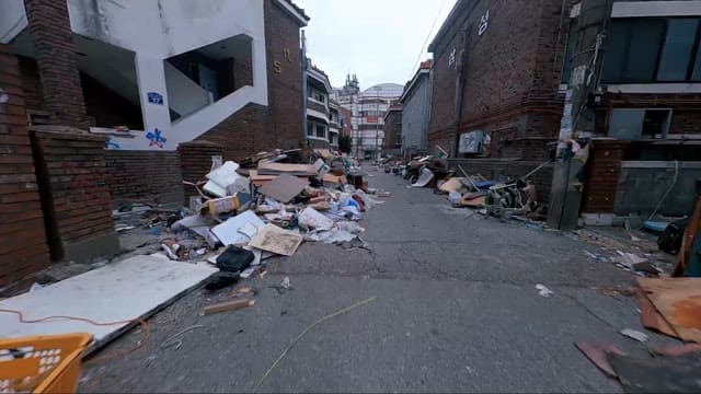 Cluttered Street with Debris and Buildings