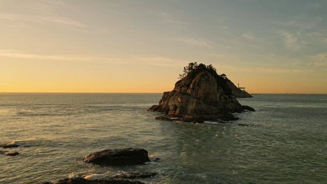 Beautiful sunset view of the island over the vast sea