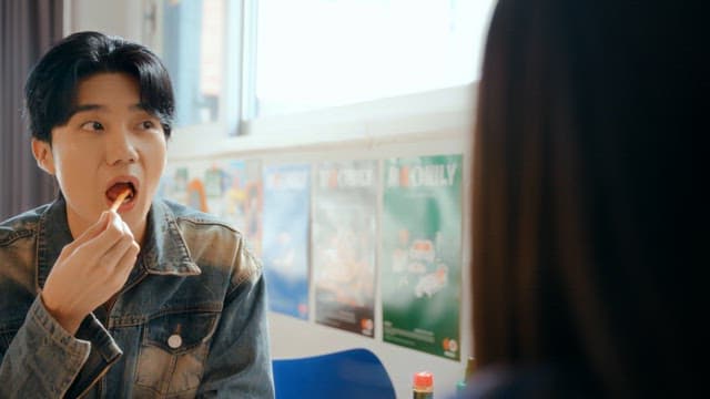 Young man enjoying a meal indoors