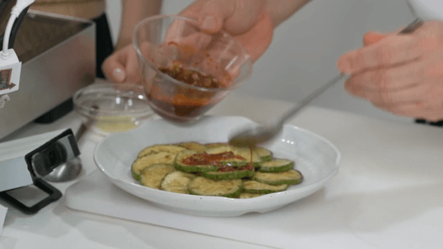 Soy sauce served with freshly cooked zucchini pancakes